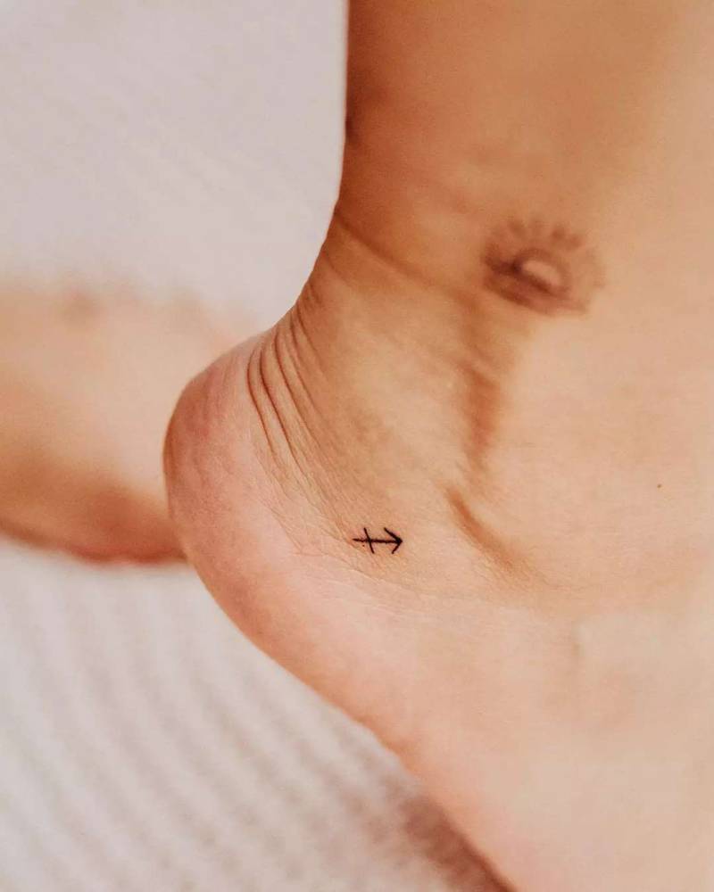 female small sagittarius tattoo 0052