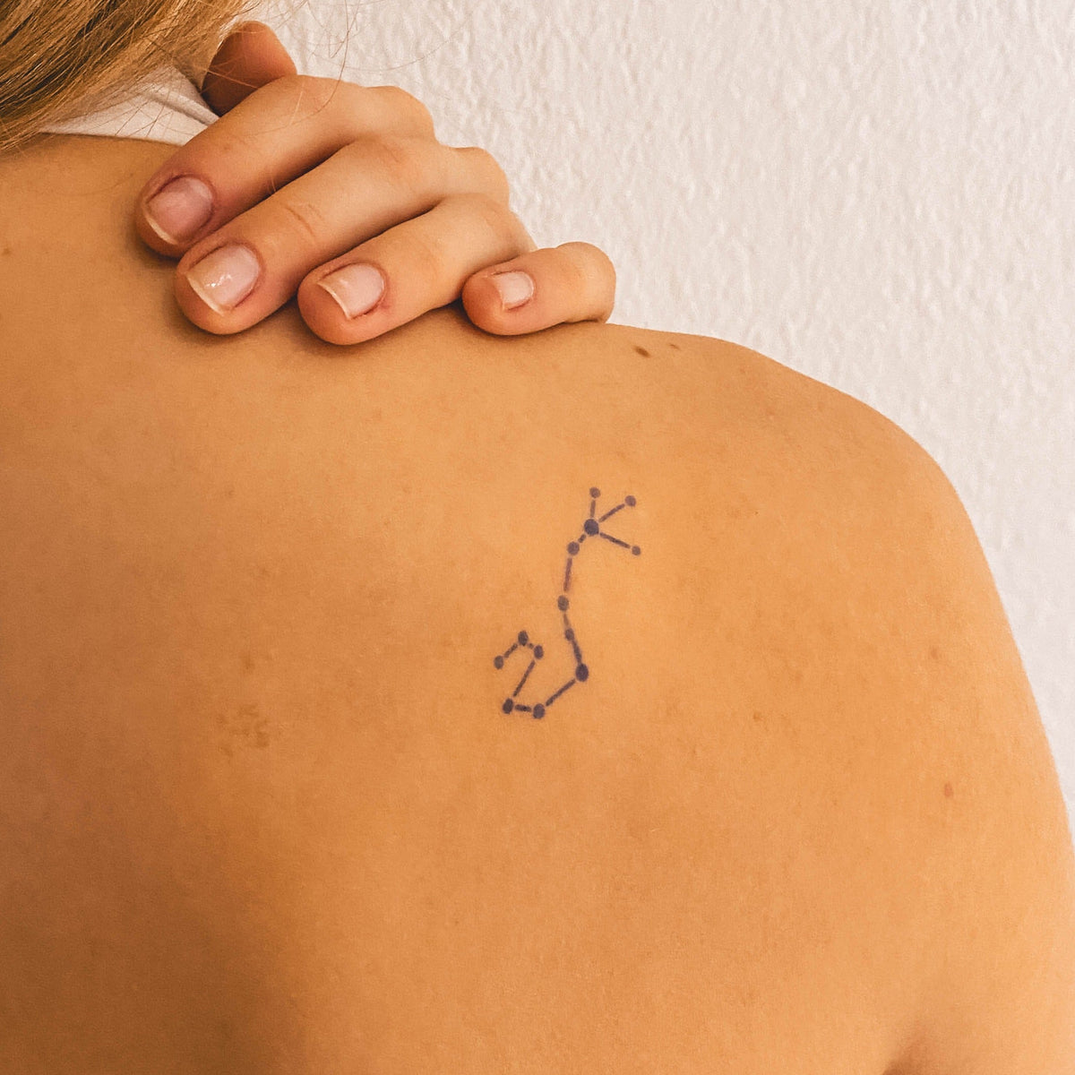 female small sagittarius tattoo 0064