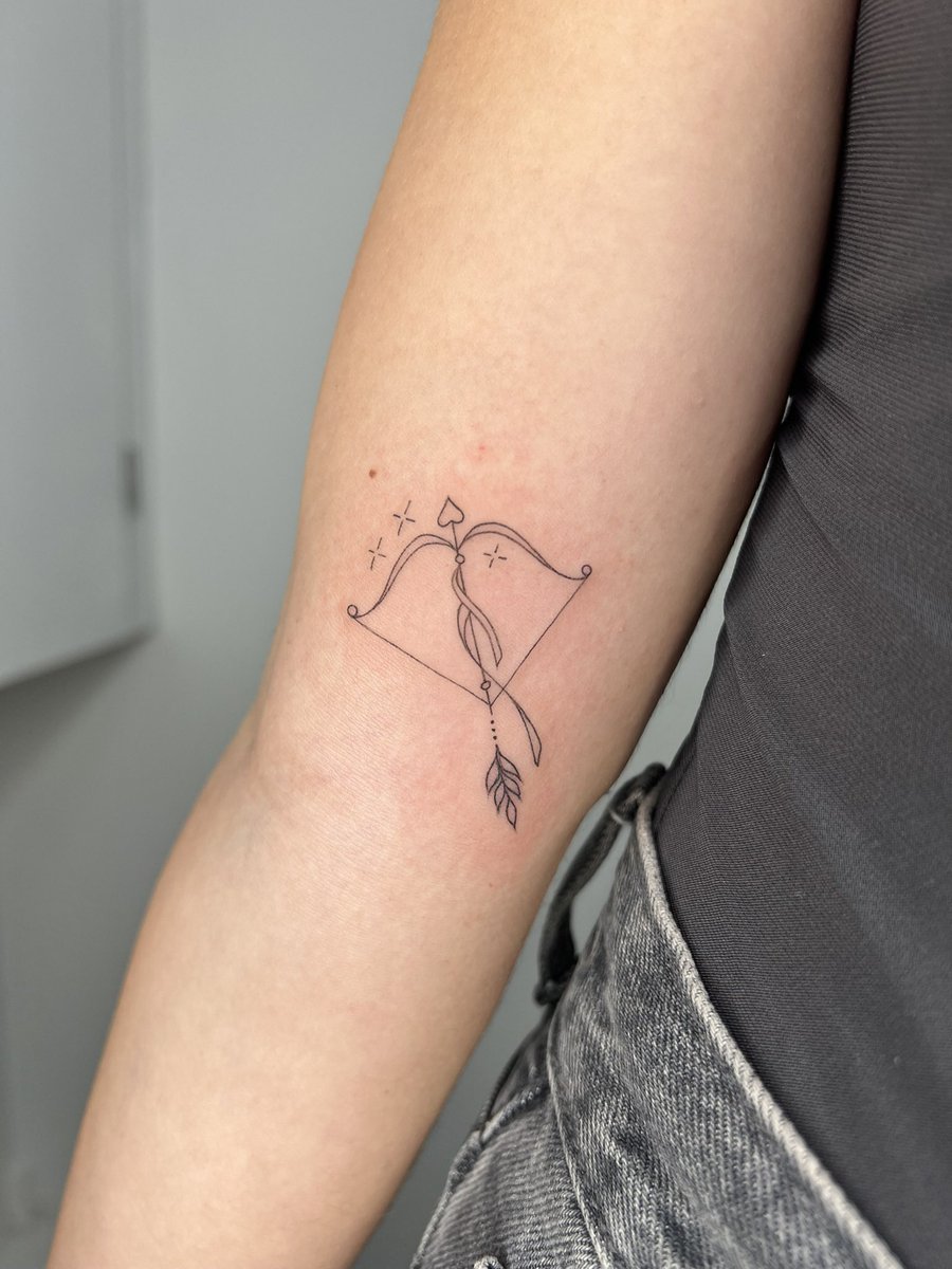 female small sagittarius tattoo 0069