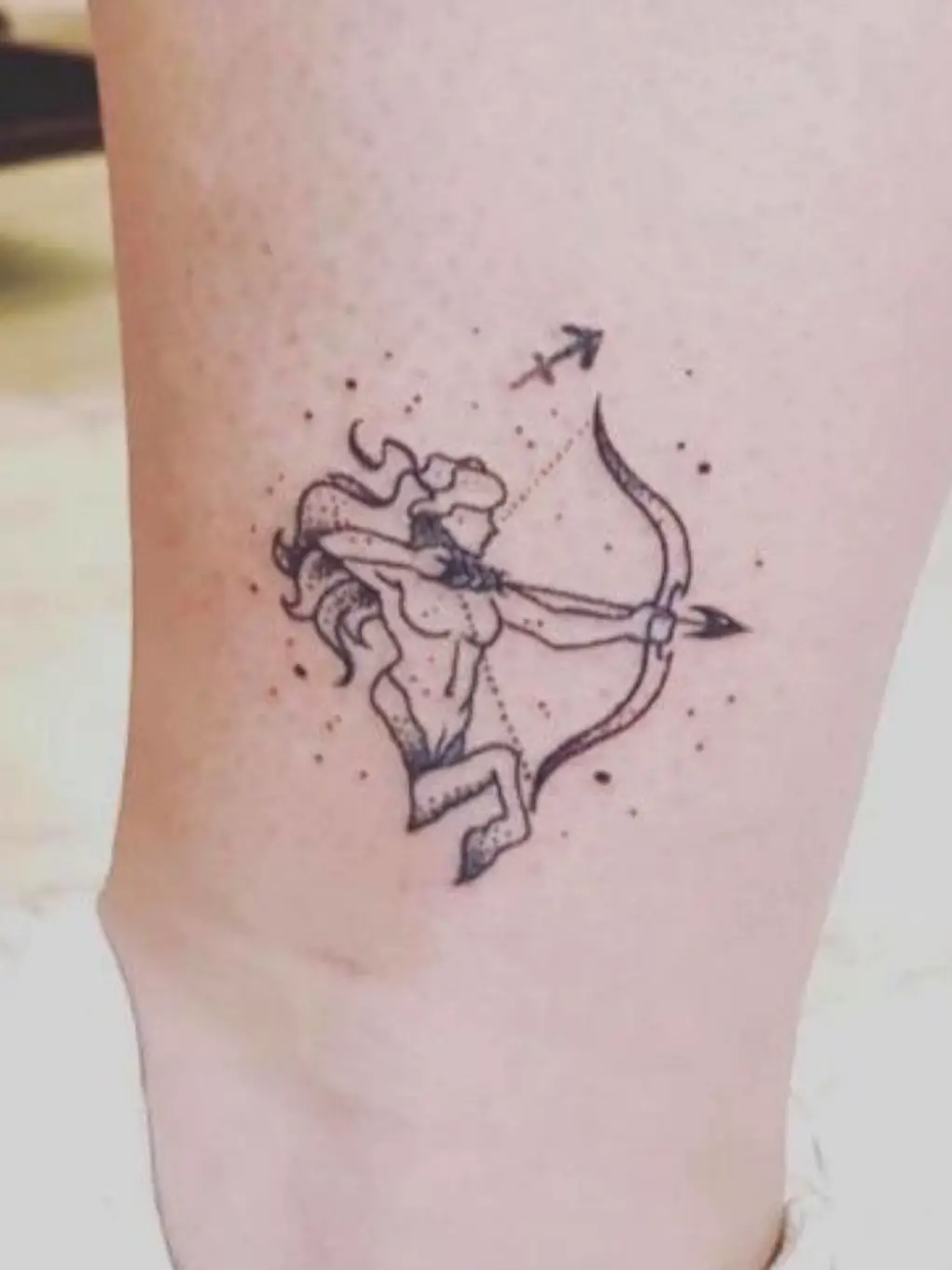 female small sagittarius tattoo 0071