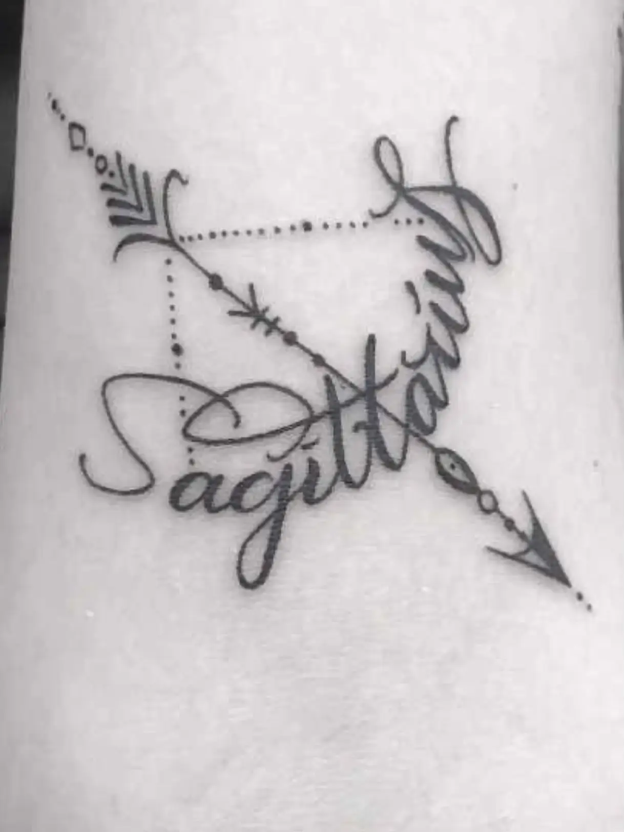 female small sagittarius tattoo 0081