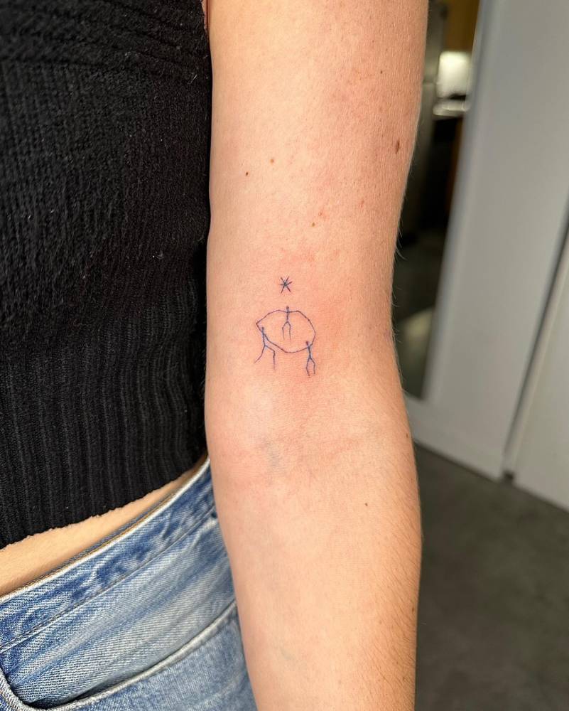 female small sagittarius tattoo 0082