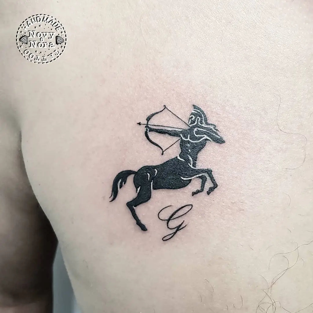 female small sagittarius tattoo 0086