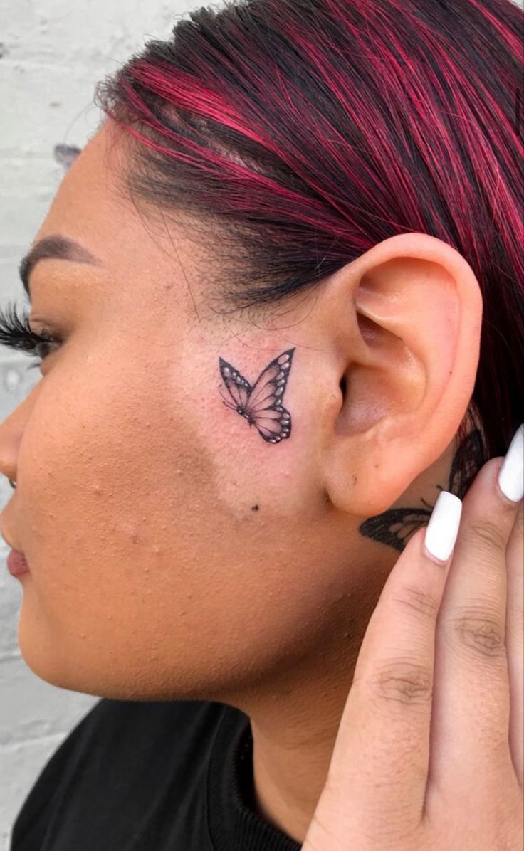 female small side face tattoo 0023