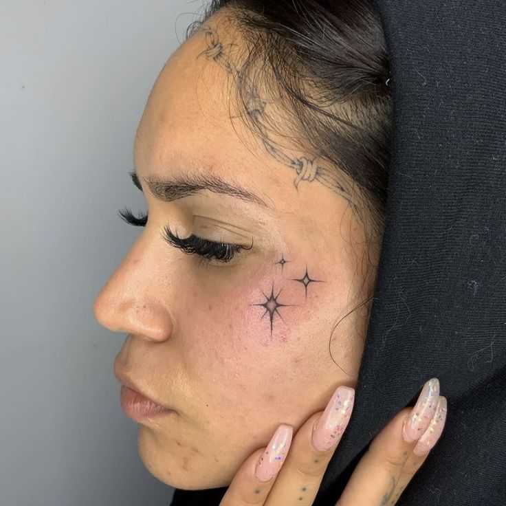 female small side face tattoo 0025