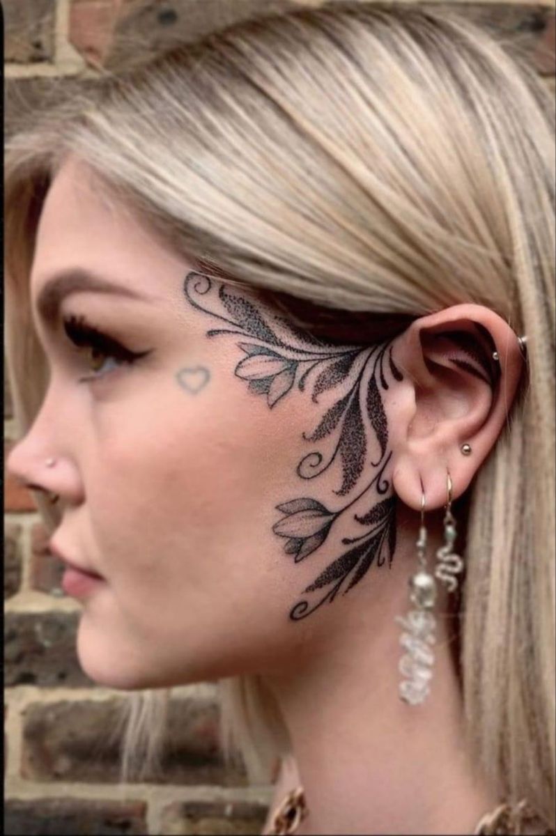 female small side face tattoo 0026