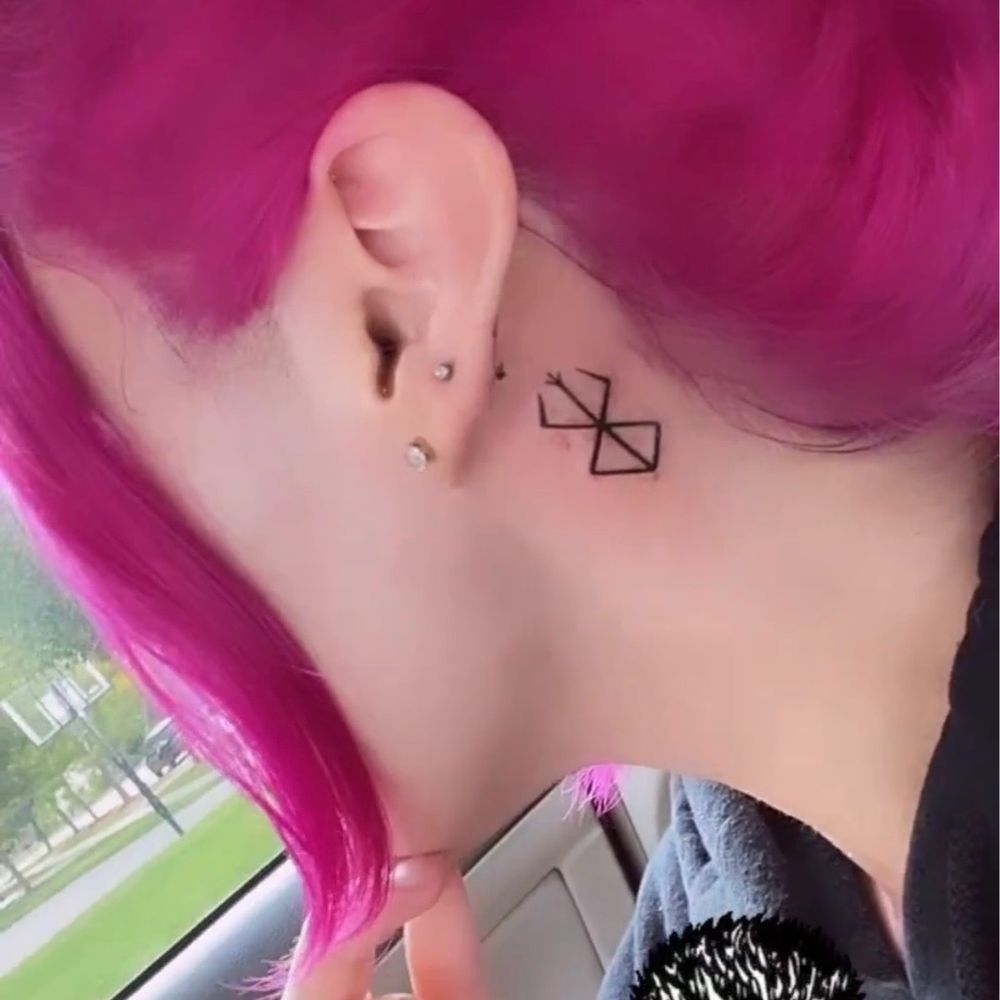 female small side face tattoo 0035