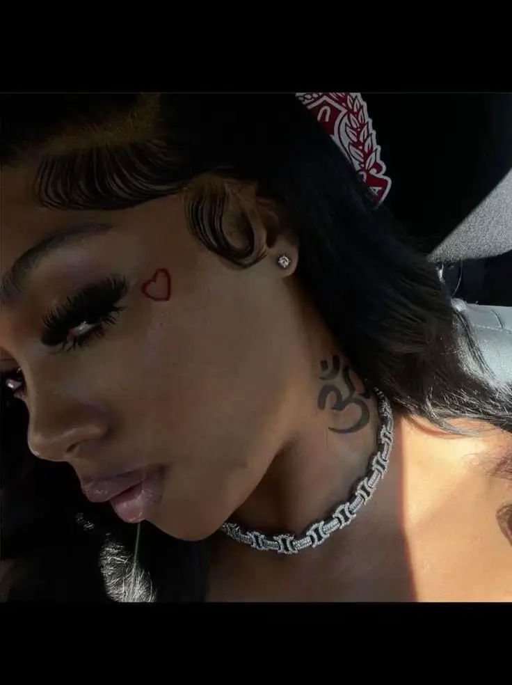 female small side face tattoo 0070