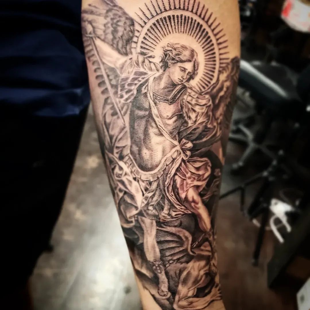 female st michael tattoo small 0052