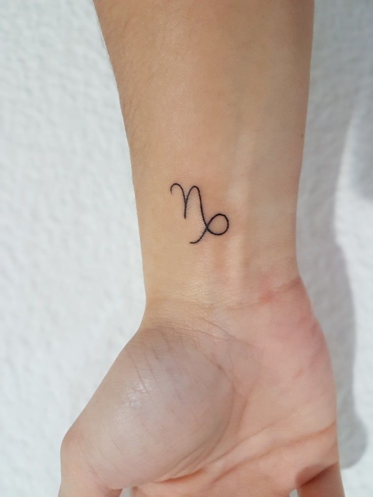 feminine capricorn tattoo small 0018