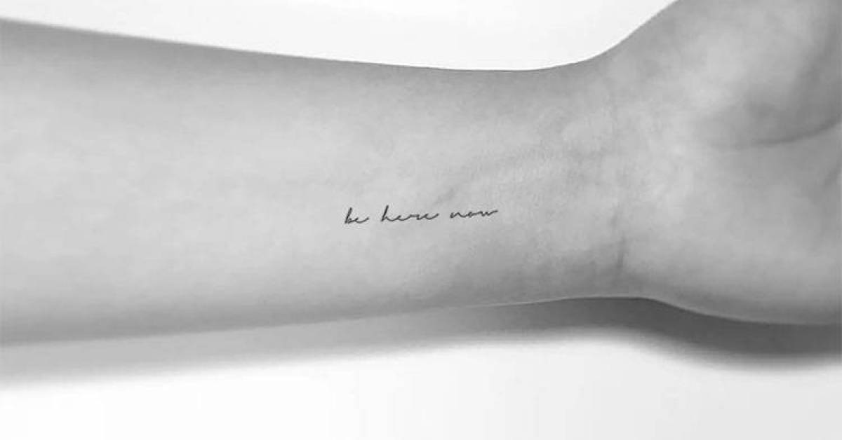 feminine small cursive tattoo 0051