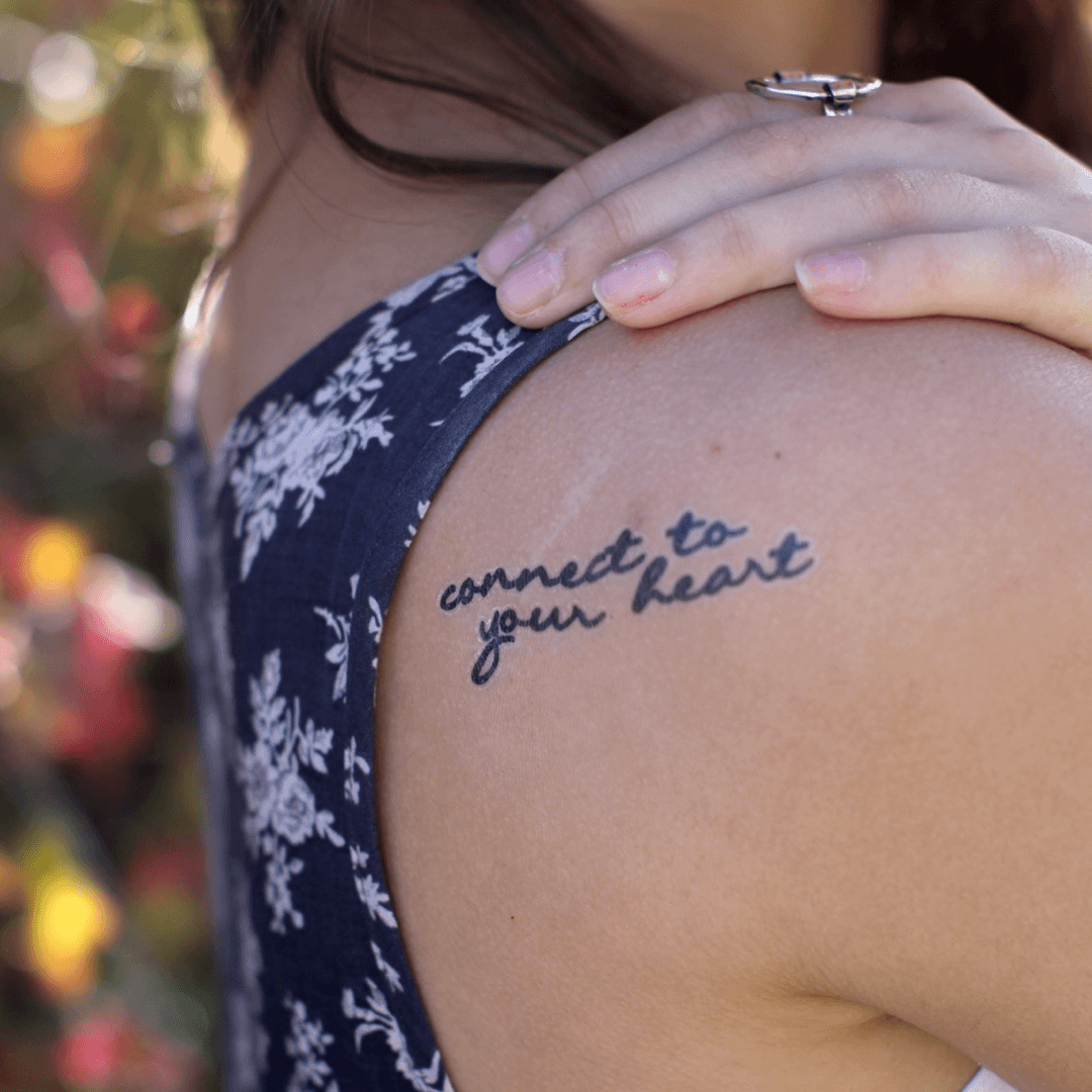 feminine small cursive tattoo 0075