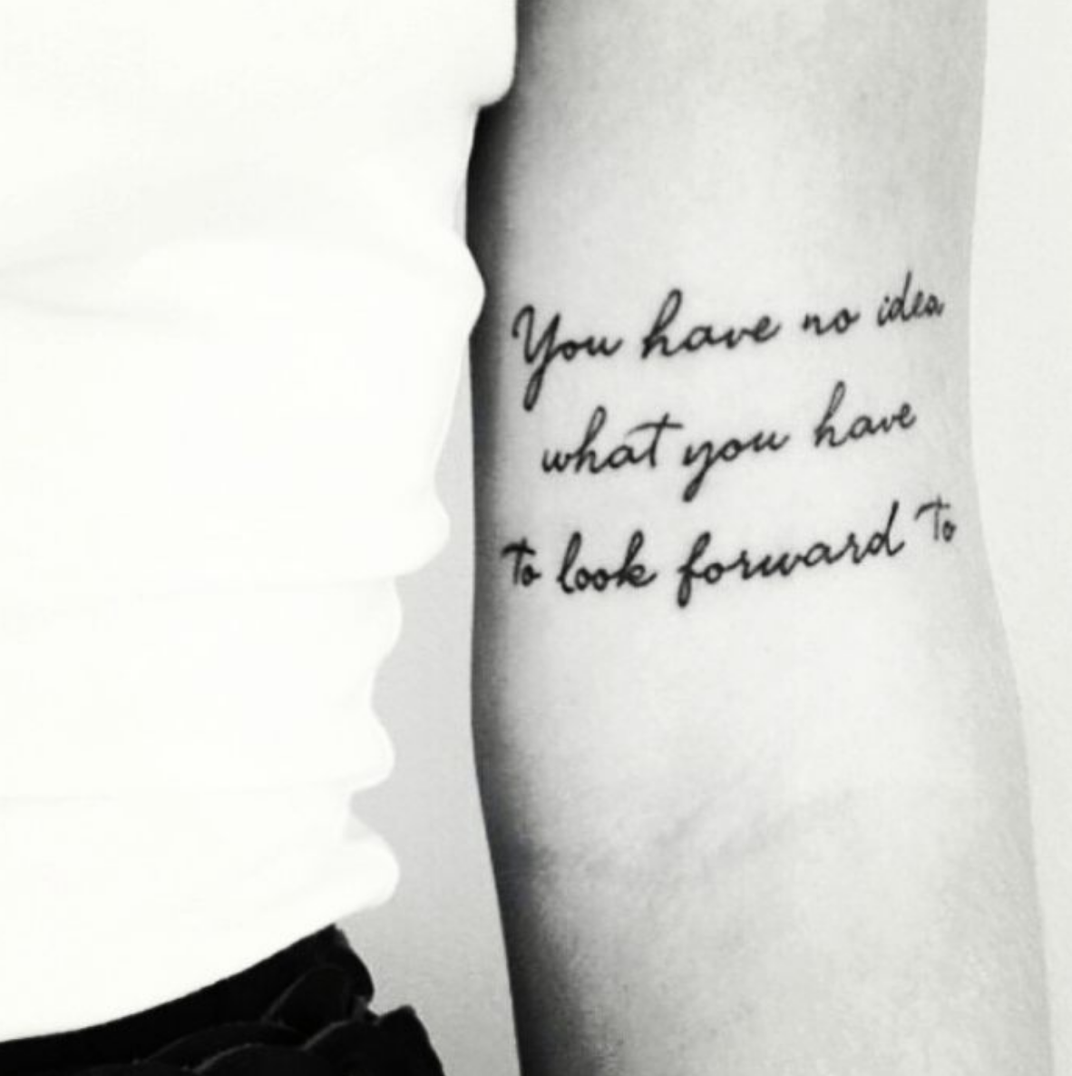 feminine small cursive tattoo 0087