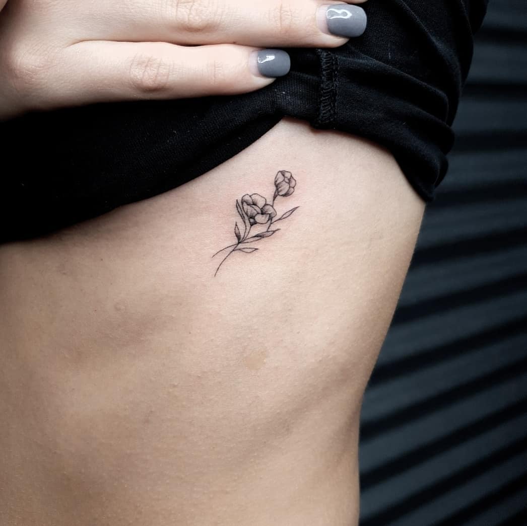 feminine small cursive tattoo 0093