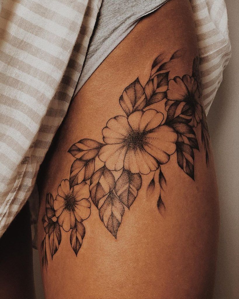 floral thigh tattoo inspiration for women