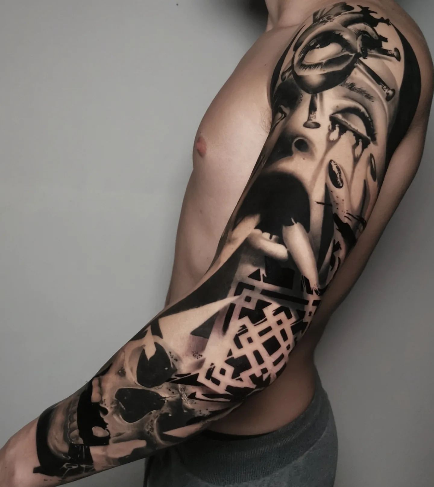 geometric tattoo sleeve ideas for men