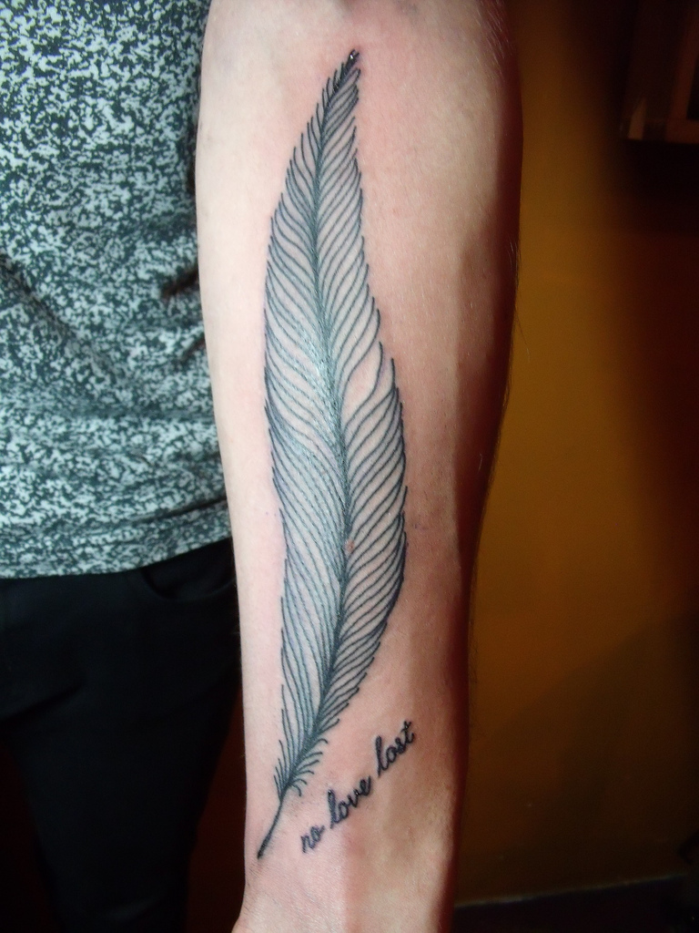 lower arm tattoos ideas for guys 0059