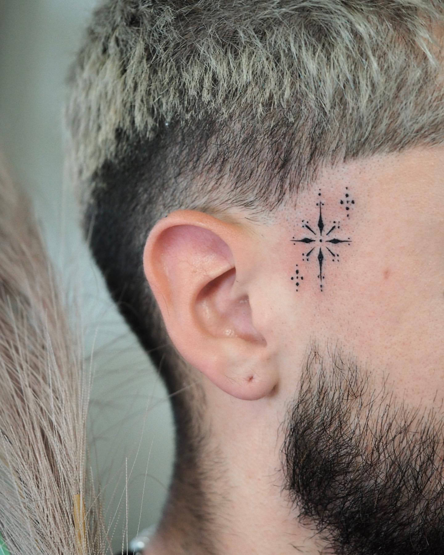 Male small face tattoo 0010