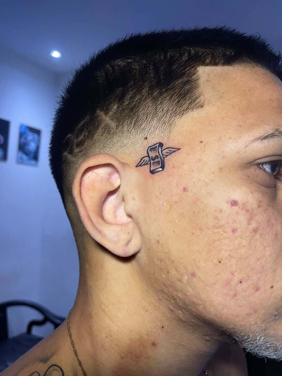 Male small face tattoo 0011