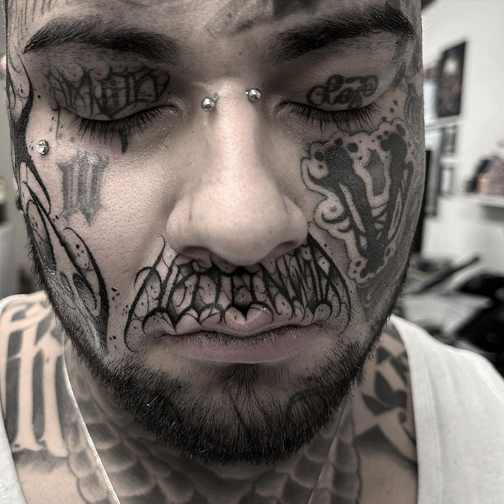 Male small face tattoo 0030