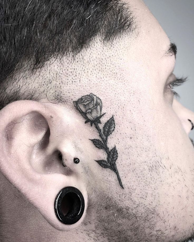 Male small face tattoo 0033