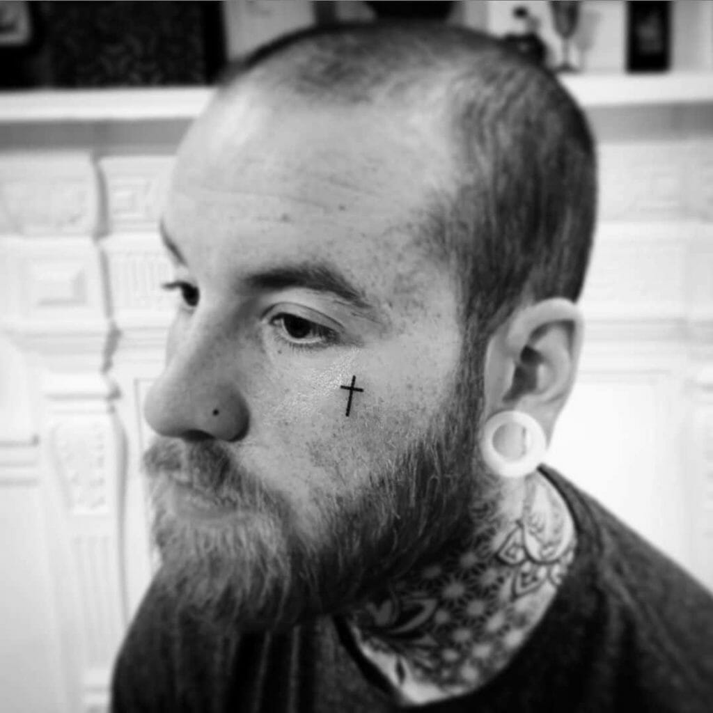 Male small face tattoo 0052