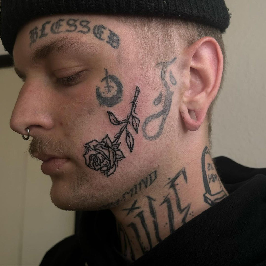 Male small face tattoo 0077