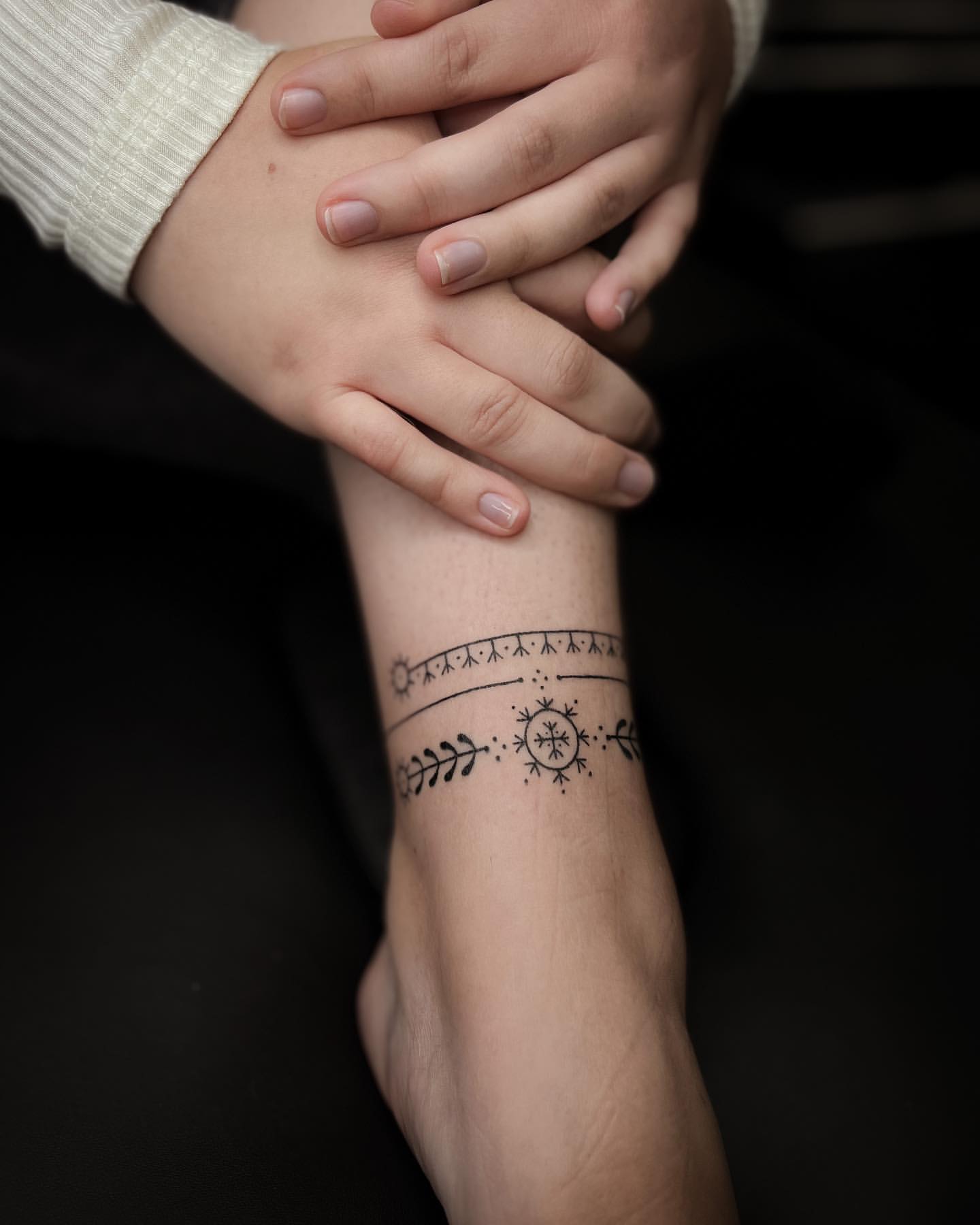 meaningful ankle chain tattoo themes