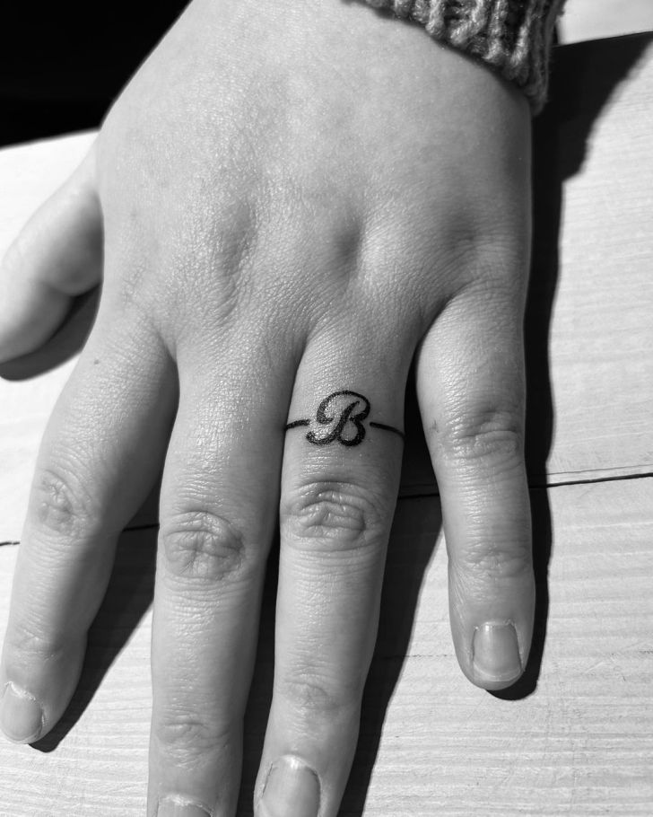 meaningful ring finger tattoos