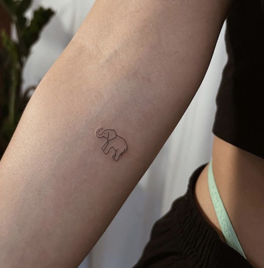 meaningful small elephant tattoo