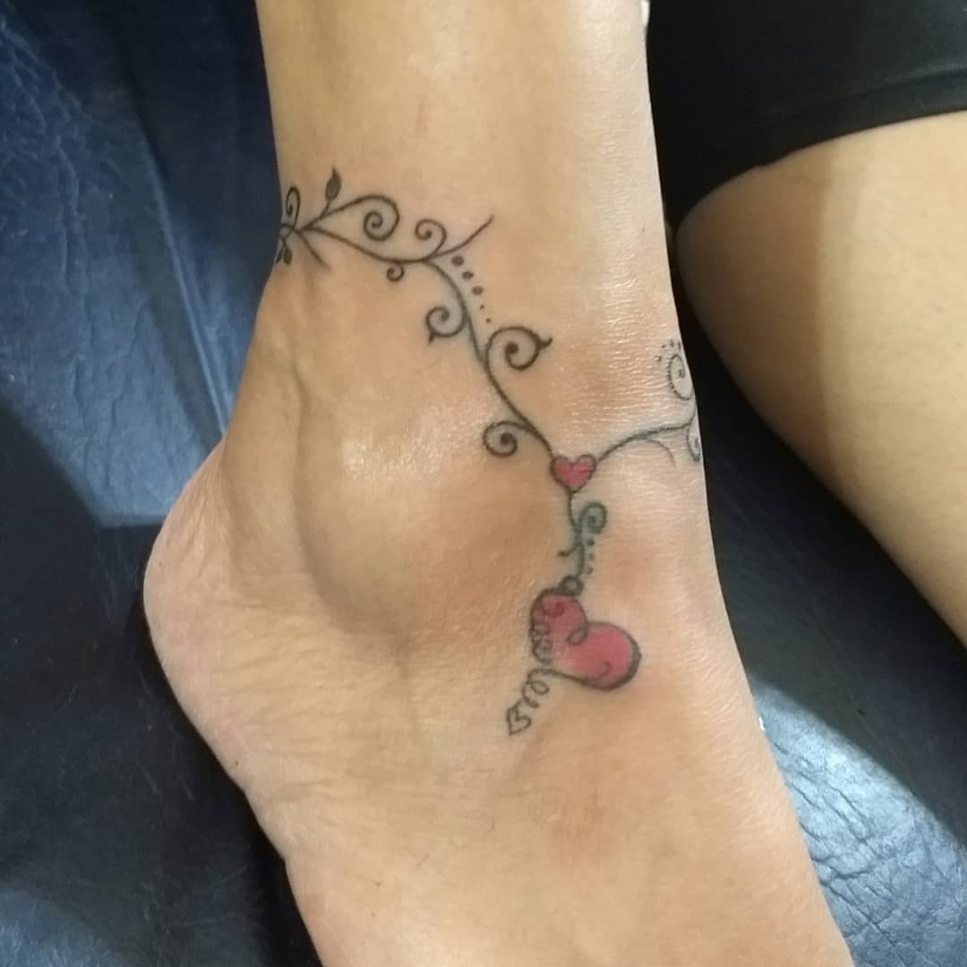 minimalist ankle chain tattoo variations.