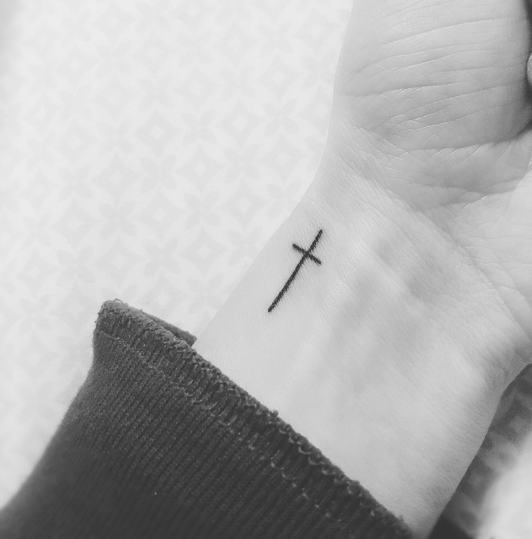 Minimalist cross tattoo designs