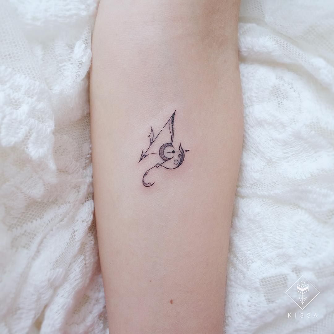 minimalist small Capricorn tattoo inspiration