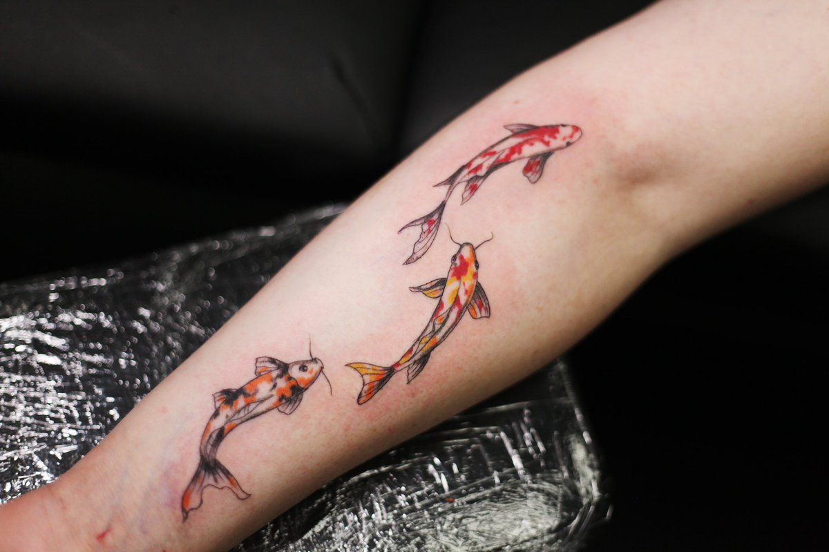 minimalist small koi fish tattoo 0073