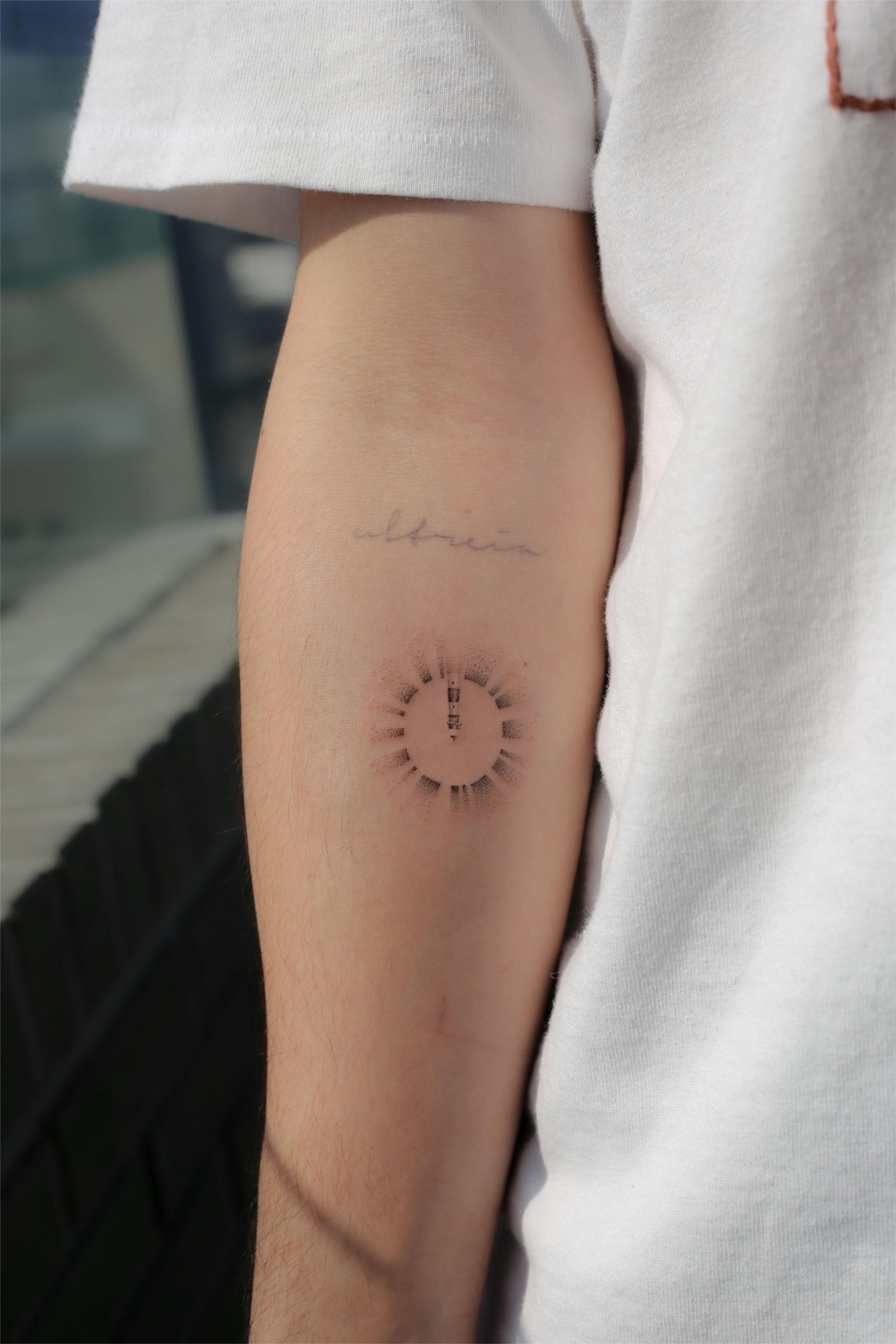 Minimalist small lighthouse tattoo