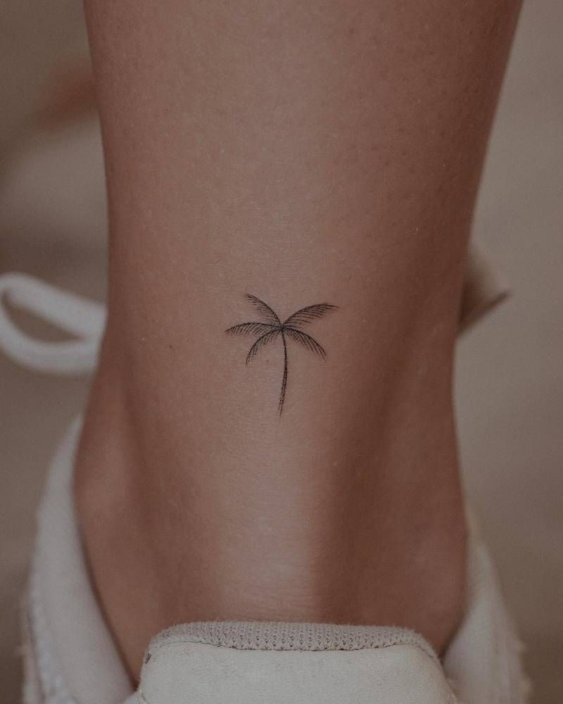 minimalist small palm tree tattoo outline