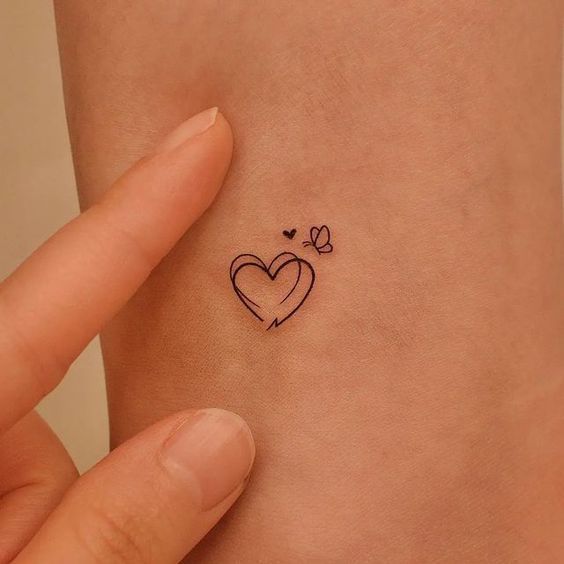 minimalist small penguin tattoo 0022