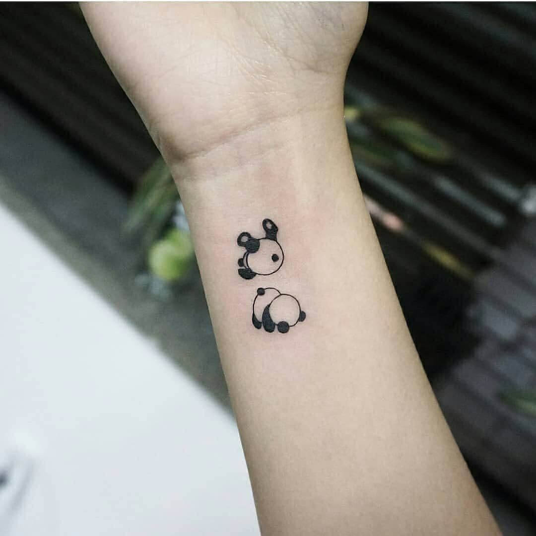 minimalist small penguin tattoo 0036