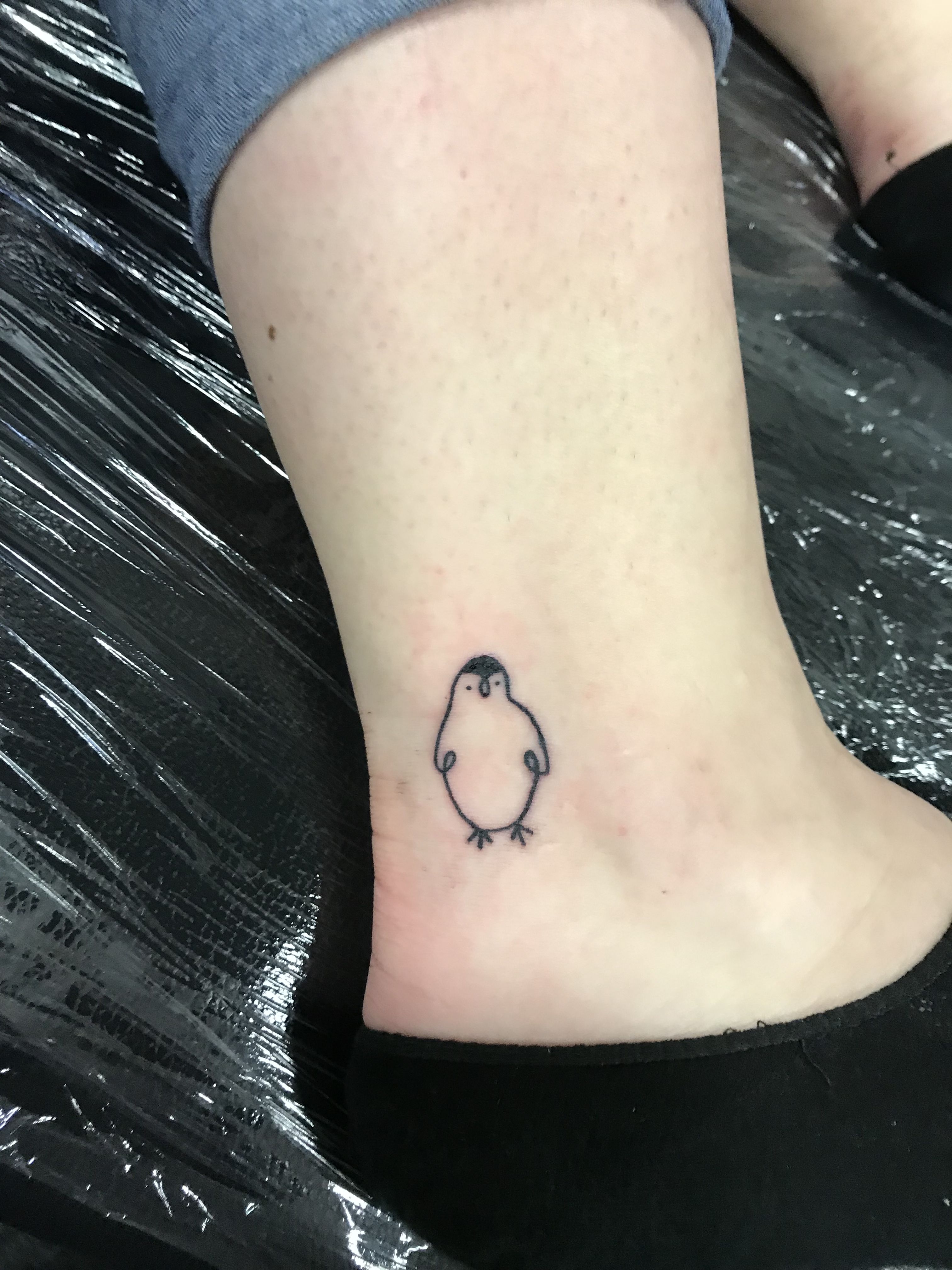 minimalist small penguin tattoo 0046