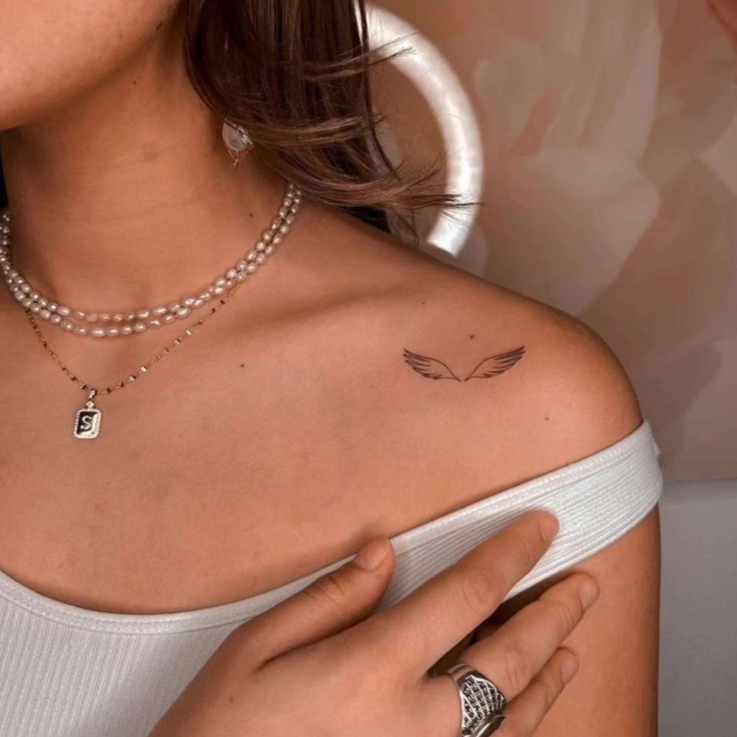 minimalist tattoos on collar bone