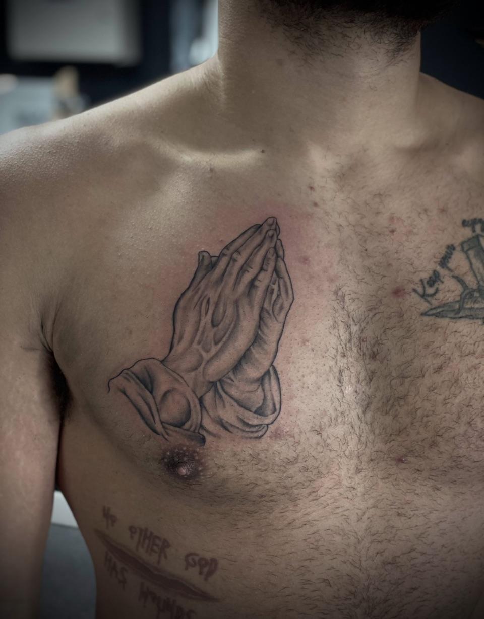 modern praying hands tattoo ideas for subtlety