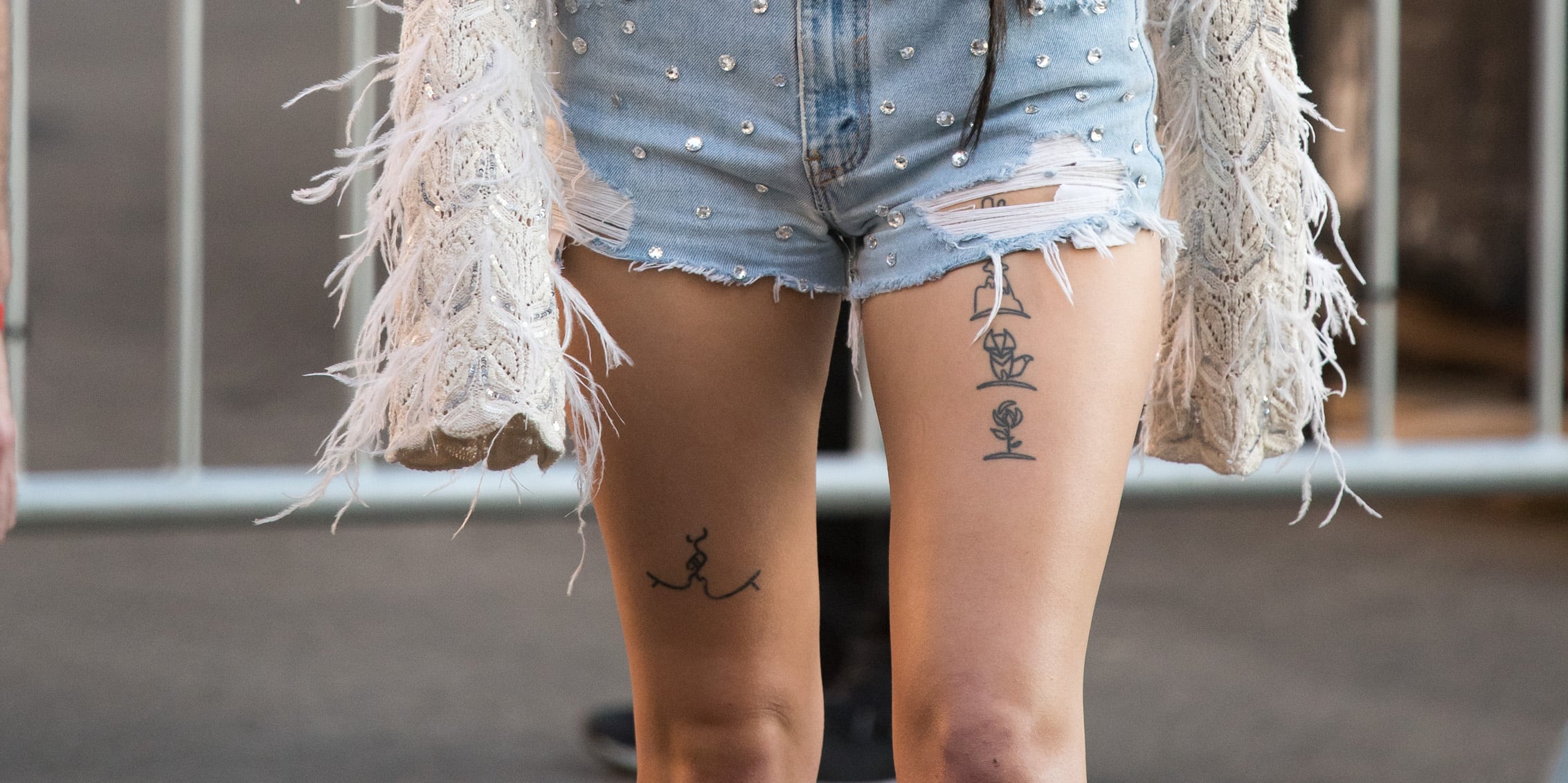 modern thigh tattoo styles.