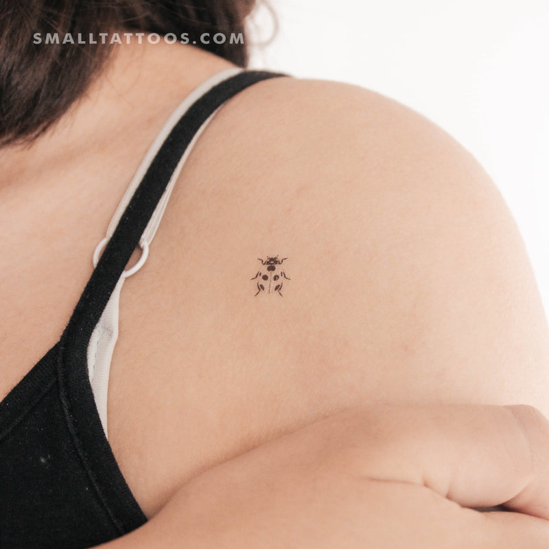 simple small ladybug tattoo 0028