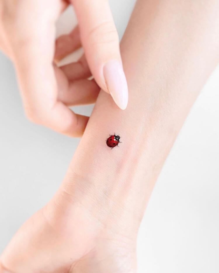 simple small ladybug tattoo 0031