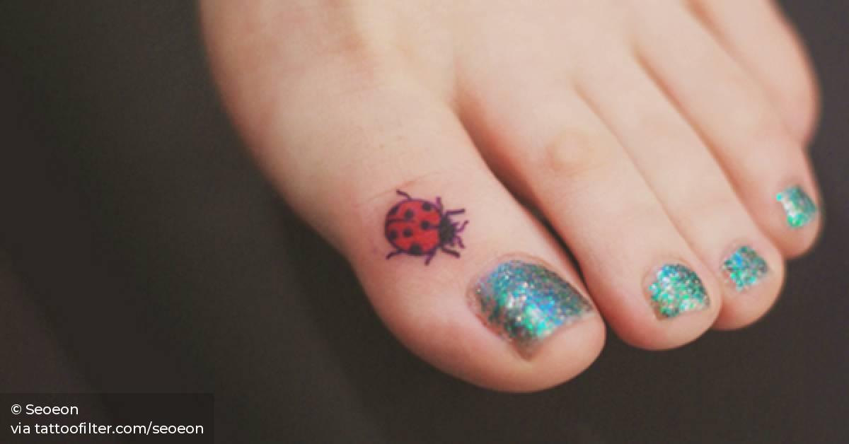 simple small ladybug tattoo 0046