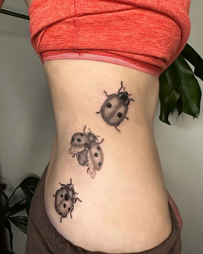 simple small ladybug tattoo 0054