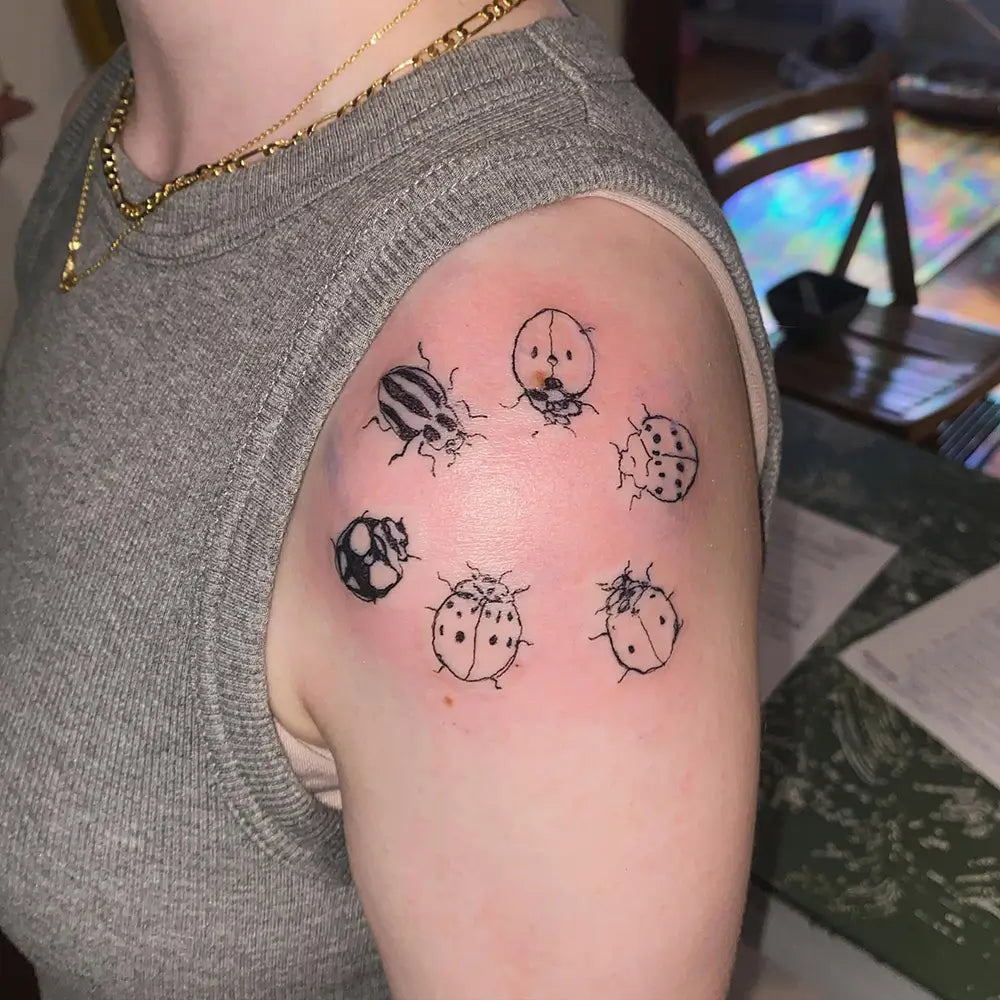 simple small ladybug tattoo 0093