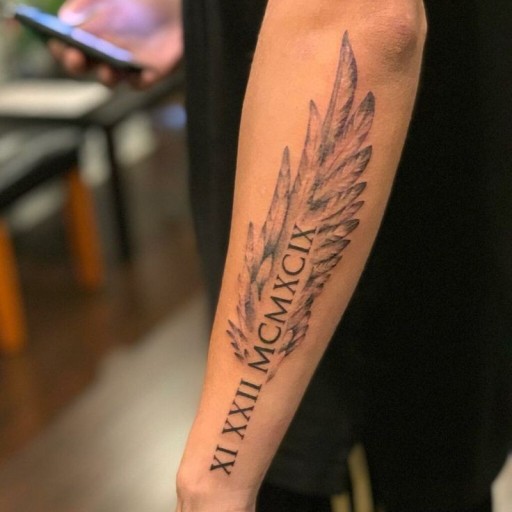 Small angel wings tattoo 0015