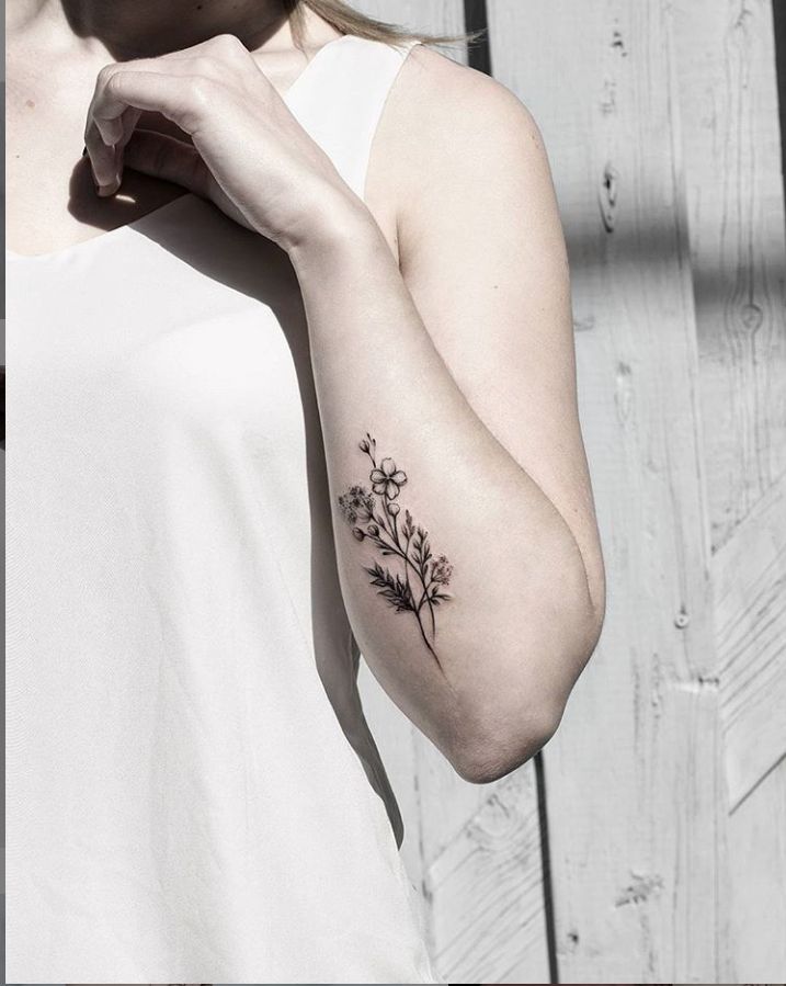 Small arm tattoo placement 0036