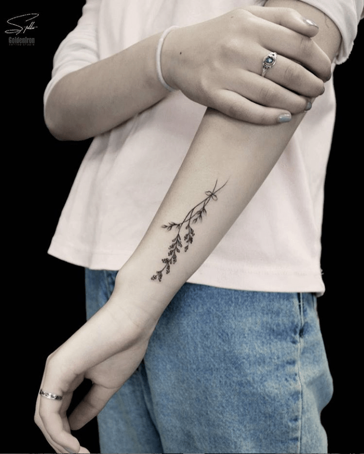 Small arm tattoo placement 0056